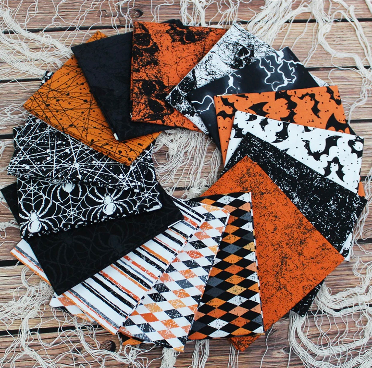 2 and 1/2 yard bundle of 15 prints from the frightful collection by Patrick Lose.