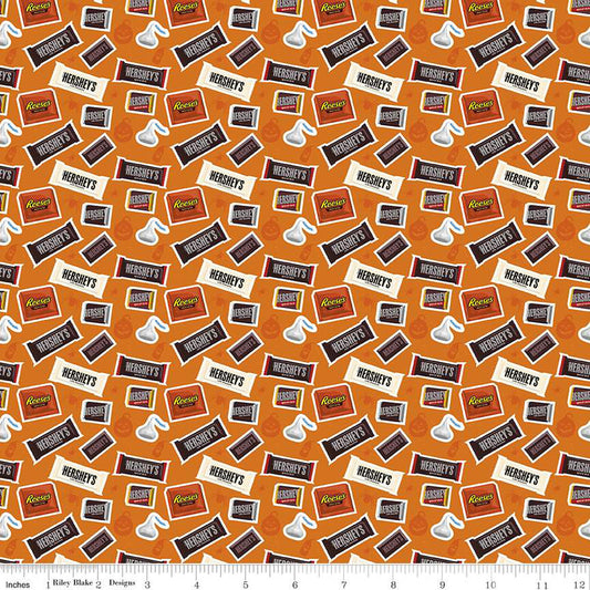 Celebrate with Hershey Candy Toss Orange fabric by the yard online only